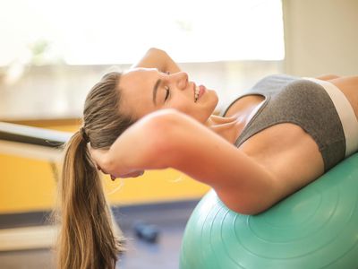 Close-up of hands positioned during a stability exercise.